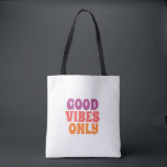 اً: Colorful Good Vibes Only Tote Bag<br><div class="desc">Spread positivity with this stylish 'Good Vibes Only' tote bag. Featuring a vibrant and modern typography design in pink and orange tones, this durable canvas bag is perfect for shopping, school, beach trips, or daily errands. A great motivational gift for friends and family.</div>