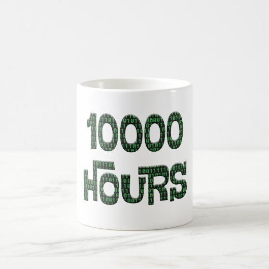 10000 hours with an overlay of computer binary cod koffiemok (Center)