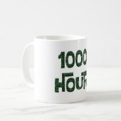 10000 uur met een overlay van computer binaire cod koffiemok (Voorkant links)