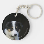 12 weken oude grenskraam sleutelhanger (Achterkant)