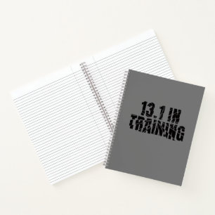 13.1 In opleiding met een halfslager gebroken glas Notitieboek