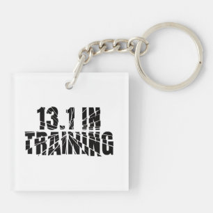 13.1 In opleiding met een halfslager gebroken glas Sleutelhanger