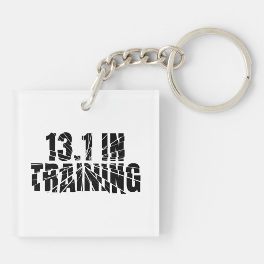 13.1 In opleiding met een halfslager gebroken glas Sleutelhanger (Achterkant)