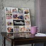 13 Monogram fotocollage familie Canvas Afdruk<br><div class="desc">Deze moderne fotocollage heeft ruimte voor 13 foto's rond het woord Familie in een vette doopvont,  er is ook ruimte voor uw familienaam.</div>