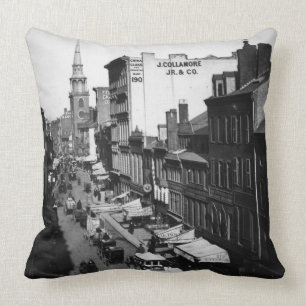 1859:  Verkeer en winkels in Washington Street Kussen
