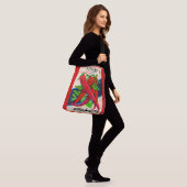 1950s zaadpakket kayenne peper print crossbody tas (Op model)