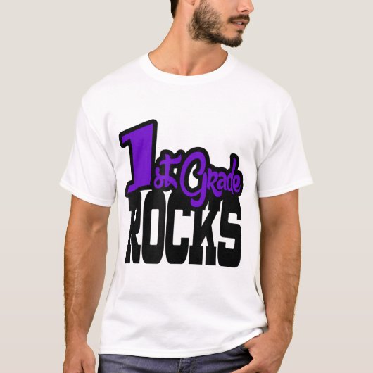 1e Grade ROCKS Paarse School Teacher Gift T-shirt (Voorkant)