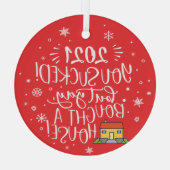 2022 is opgezogen maar heeft een huis gekocht met  glas ornament (Achterkant)