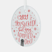 2022 is opgezogen maar heeft een witte hondenhok g glas ornament (Voorkant links)