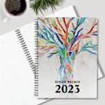 2023 Aangepaste naam Planner<br><div class="desc">Deze unieke Planner is versierd met een helder gekleurde boom. Het oorspronkelijke ontwerp werd gemaakt in mozaïek met kleine stukjes glas. Pas het aan met jouw naam en jaar. Om verder uit te geven gebruik het Hulpmiddel van het Ontwerp om de doopvont, de doopvontgrootte, of de kleur te veranderen. Omdat...</div>