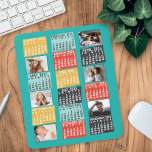 2025 Jaar Maandkalender Moderne Fotocollage Muismat<br><div class="desc">Deze gepersonaliseerde 2025-jarige maandelijkse kalendermousepad heeft een moderne geometrische look uit het midden van de eeuw met asymmetrische kleurblokken en uitgesneden typografie in papierstijl. Gebruik de eenvoudige sjablonen om zes van je favoriete foto's toe te voegen (horizontaal werkt het beste, maar alle vormen passen zich automatisch aan de lijsten aan)....</div>