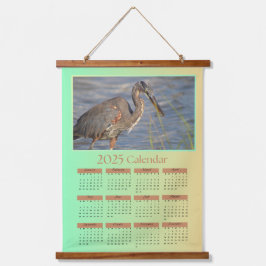 2025 Tapestry Calendar, een reiger die zich voedt  Hangend Wandkleed