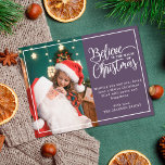 2 familiefoto's violet Geloof in kerstmagie Feestdagenkaart<br><div class="desc">Een modern briefkaart met een van uw favoriete kerstfamilieportretten aan de linkerkant, aangevuld met een echt gouden folie lijst en een tekst met de tekst "Geloof in de magie van Kerstmis" aan de rechterkant over een moderne violette achtergrond, aanpasbaar met uw eigen groetboodschap. De achterkant van het briefkaart is aanpasbaar...</div>