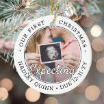 2 Foto 1st Xmas Verwacht Baby Nieuwe Ouders Modern Keramisch Ornament<br><div class="desc">Viel het kostbare geschenk van uw nieuwste familielid met een stijlvol ornament met twee foto's rond keramiek. Genderneutraal ontwerp is geschikt voor een nieuwe baby of meisje. De woorden en de afbeeldingen op deze sjabloon zijn eenvoudig te personaliseren, en kunnen verschillend of het zelfde op voor en rug zijn. (AFBEELDING...</div>