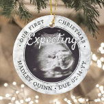 2 Foto Baby Ultrasound nieuwe ouders Faux Marble Keramisch Ornament<br><div class="desc">Viel het kostbare geschenk van uw nieuwste familielid met een stijlvol ornament met twee foto's rond keramiek. Genderneutraal ontwerp is geschikt voor een nieuwe baby of meisje. De woorden en de afbeeldingen op deze sjabloon zijn eenvoudig te personaliseren, en kunnen verschillend of het zelfde op voor en rug zijn. (AFBEELDING...</div>