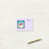 2 Helderrode kopballonnen die naar boven drijven Post-it® Notes (Op bureau)