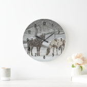 2 Paarden buiten in de winter tijdens het sneeuwwe Grote Klok (Huis)