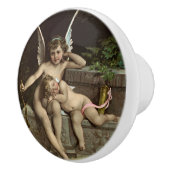2 retro cupido's zitten keramische knop (Rechts)