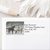 2 Sneeuwpaarden die onder een boom staan Etiket (Insitu)