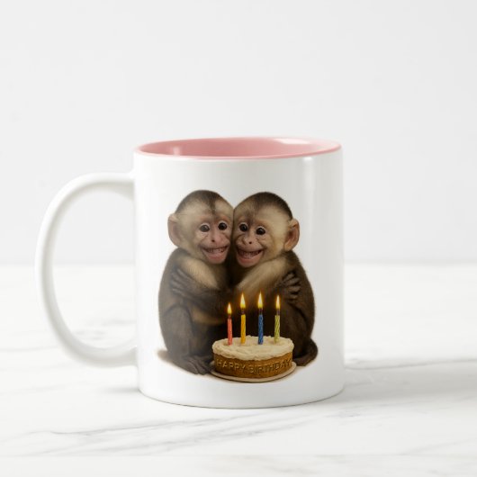 2 sweet Capuchin monkeys lovingly embrace + cake Tweekleurige Koffiemok (Links)