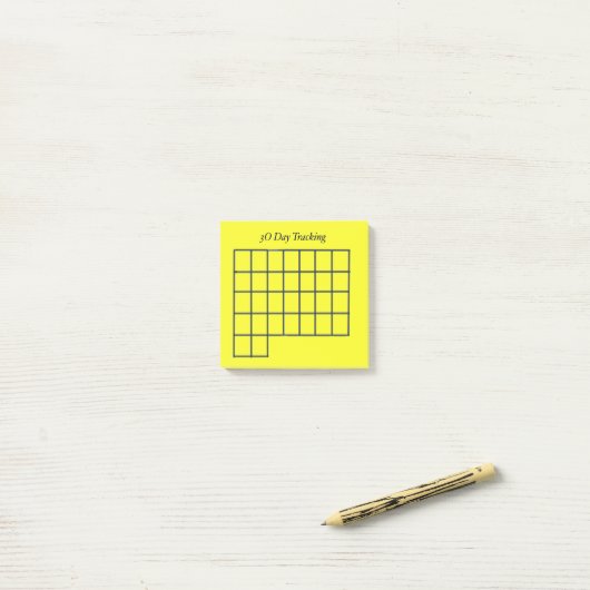 30 dagen tracker gele plakkerige notities post-it® notes (Op bureau)