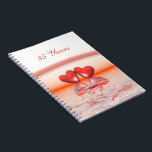 35e Jubileum koraalharten Notitieboek<br><div class="desc">Een handig notitieboek met mijn afbeelding van twee koraalharten die op het water drijven onder een regenboog. De tekst luidt "35 jaar".</div>
