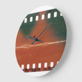 35mm filmstrip start, coole krassen. grote klok (Hoek)