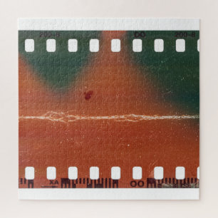 35mm filmstrip start, coole krassen. legpuzzel