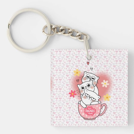 3 katten met bloemen en een mok sleutelhanger (voorkant)