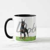 3 zwarte Doberman Pinschers met stamnaam Mok (Links)