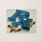 3D RX-symbool met capsules Legpuzzel (Horizontaal)