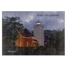 40 Mile Point Lighthouse bij schemering snijbord