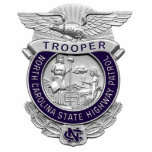494px-NC_-_Highway_Patrol_Badge Staand Fotobeeldje<br><div class="desc">HOOG PATROL</div>