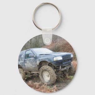 4x4 uit-roader op modder sleutelhanger