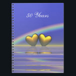 50e Jubileum Golden Hearts Notitieboek<br><div class="desc">Notitieboek met mijn afbeelding van gouden harten die op het water drijven onder een regenboog. In de  tekst staat "50 jaar".</div>