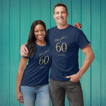 60th Birthday Party Gold Script Blue T-shirt<br><div class="desc">Laat je geliefde er chic en elegant uitzien op hun speciale dag met dit gemakkelijk gepersonaliseerde 60e verjaardagsfeestje gouden script blauw T-shirt. Verkrijgbaar in verschillende maten, dit verfijnde blauwe t-shirt is voorzien van een klassiek gouden script. Perfect voor elke verjaardagsviering, dit aangepaste shirt zal ervoor zorgen dat de eregast opvalt...</div>