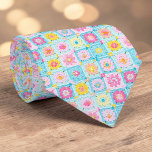 70s Granny Square Crochet Necktie Stropdas<br><div class="desc">This unique necktie features a vibrant 70s-inspired design, crafted with intricate granny square crochet. It's a bold and stylish statement piece, perfect for adding a touch of retro charm and handmade artistry to any outfit. The warm, inviting colors and textured pattern make it a conversation starter, suitable for both casual...</div>