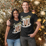 70th birthday seven and sensational gold art photo t-shirt<br><div class="desc">Zeventig en sensationele, 70e verjaardag gouden stijl effect zeventig script tekst op een zwart of donker gekleurd t-shirt. Personaliseer dit 70ste shirt met je eigen boodschap en vierkante foto van je verjaardagsmeisje of -jongen. Andere jaren en overeenkomende objecten zijn beschikbaar. © Origineel ontwerp van Sarah Trett voor www.mylittleeden.com op Zazzle....</div>