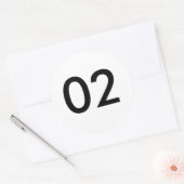78702 RONDE STICKER (Envelop)