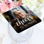 80th Birthday Party Photo White Script Cheers Kartonnen Onderzetters<br><div class="desc">This custom 80th birthday paper coaster features the guest of honor's personalized photo,  name,  and birthday,  along with the word "Cheers" in elegant white calligraphy script. A dark screen helps make the text pop. A great way to celebrate someone who's turning eighty!</div>