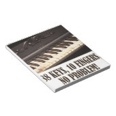 88 sleutels, 10 vingers, geen probleem! notitieblok (Schuin)