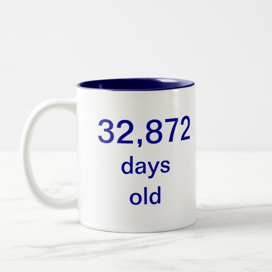 90 jaar oud tweekleurige koffiemok (Links)