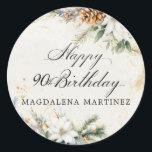 90e Verjaardag Party Witte Winter Bloemen Custom Ronde Sticker<br><div class="desc">Elegante winterwitte bloemen zijn genesteld in dennengroen en pinecones. De zachte ivoorwitte waterverf wasachtergrond is geaccentueerd met gouden vlekken om een verfijnde en chique esthetiek te creëer.</div>
