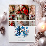 9 Foto Blue Snowman Eerste Kerstmis Feestdagenkaart<br><div class="desc">Vier het eerste vakantieseizoen van je kleintje met dit vrolijke winterontwerp met een blauw plaid nummer, een schattige sneeuwpop en verspreide snoepstokken en geschenken. Pas het aan met de foto- en geboortegegevens van je baby om een aandenken te creëer dat charme en magie in je vakantieherinneringen brengt.</div>
