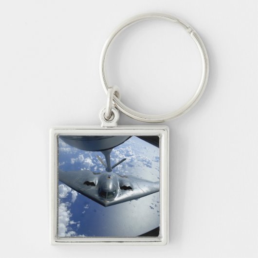 A B-2-spiriën worden in de positie gebracht voor h Sleutelhanger (Voorkant)