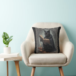 A Black Cat Wearing A Cloak Studying Halloween Kussen