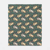 A blanket's front side features a repeating  fleece deken (Voorkant)