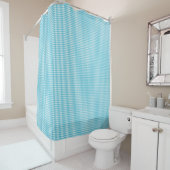 A blue checkered shower curtain is shown douchegordijn (In situ)