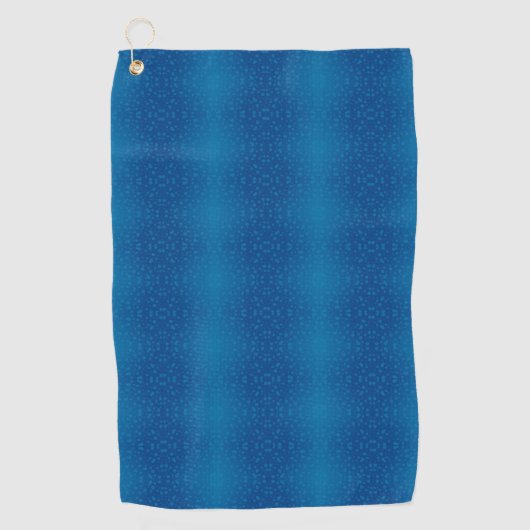 A blue towel with a subtle dotted pattern hangs golfhanddoek (Voorkant)