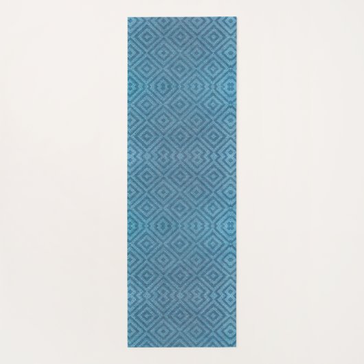 A blue yoga mat with a subtle geometric pattern  (Achterkant)